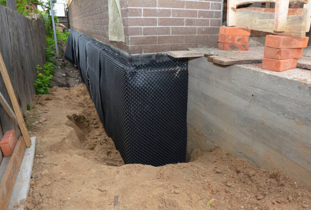 Happy homeowners after waterproofing job in Lapaz